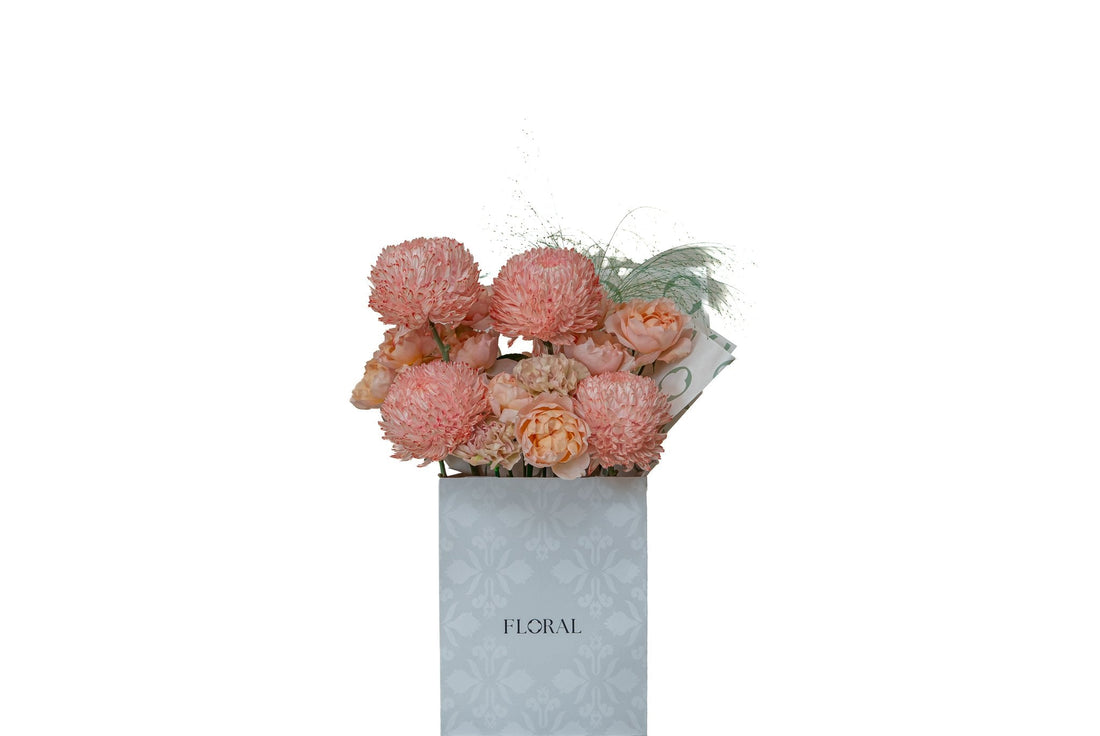 Amber Bloom by FLORAL: coral chrysanthemums and peach garden roses