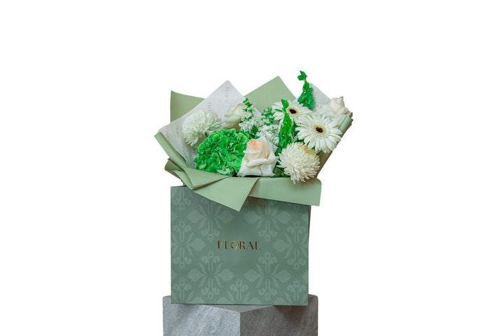 Elaria by FLORAL: green hydrangea and cream roses