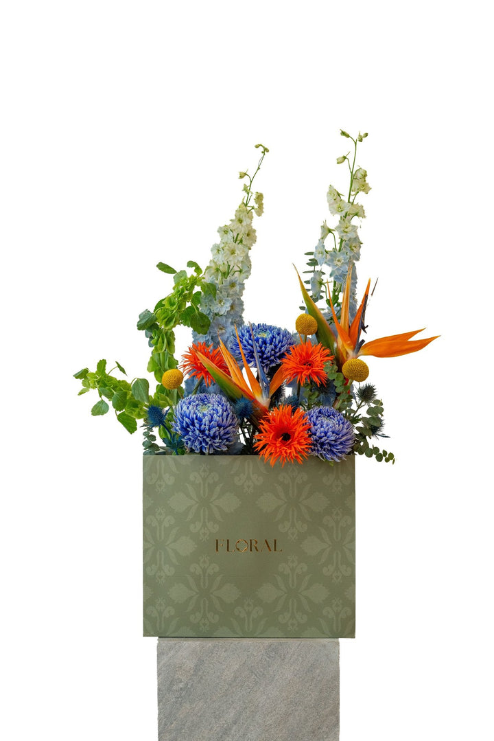 Sapphire Bird by FLORAL: light blue delphinium and blue chrysanthemums