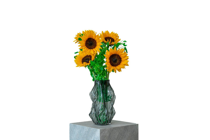 Solaris by FLORAL: sunflowers and bells of Ireland in the Crystal Wave vase